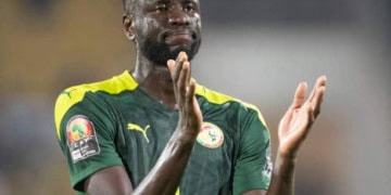 YAOUNDE, CAMEROON - JANUARY 30: CHEIKHOU KOUYATÉ of Senegal celebrates winning the Africa Cup of Nations (CAN) 2021 quarter-final football match between Senegal and Equatorial Guinea at Stade Ahmadou Ahidjo in Yaounde on January 30, 2022. (Photo by Visionhaus/Getty Images)