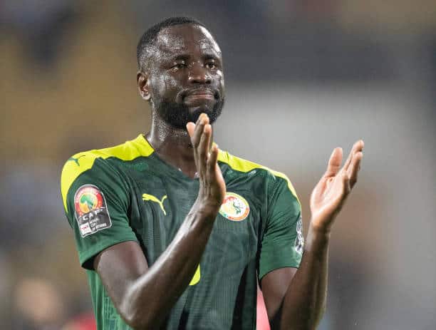 YAOUNDE, CAMEROON - JANUARY 30: CHEIKHOU KOUYATÉ of Senegal celebrates winning the Africa Cup of Nations (CAN) 2021 quarter-final football match between Senegal and Equatorial Guinea at Stade Ahmadou Ahidjo in Yaounde on January 30, 2022. (Photo by Visionhaus/Getty Images)