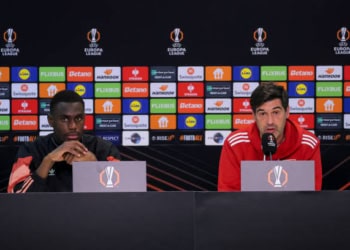 BUCHAREST, ROMANIA - MARCH 05: Moussa Niakhate and head coach of Olympique Lyonnais talks to media during a press conference at the National Arena Stadium ahead of their UEFA Europa League 2024/25 Round of 16 First Leg match against FCSB, on March 05, 2025, in Bucharest, Romania.  (Photo by Vasile Mihai-Antonio/Getty Images)
