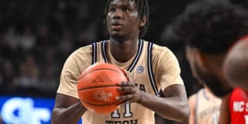ATLANTA, GA  MARCH 01:  Georgia Tech forward Baye Ndongo (11) shoots a free throw during the college basketball game between the North Carolina State Wolfpack and the Georgia Tech Yellow Jackets on March1st, 2025 at Hank McCamish Pavilion in Atlanta, GA.  (Photo by Rich von Biberstein/Icon Sportswire via Getty Images)
