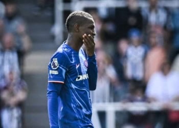 Chelsea's Senegalese striker #15 Nicolas Jackson reacts as he leaves the pitch after receiving a red card following a tackle on Newcastle United's Dutch defender #04 Sven Botman during the English Premier League football match between Newcastle United and Chelsea at St James' Park in Newcastle-upon-Tyne, north east England on May 11, 2025. (Photo by ANDY BUCHANAN / AFP) / RESTRICTED TO EDITORIAL USE. No use with unauthorized audio, video, data, fixture lists, club/league logos or 'live' services. Online in-match use limited to 120 images. An additional 40 images may be used in extra time. No video emulation. Social media in-match use limited to 120 images. An additional 40 images may be used in extra time. No use in betting publications, games or single club/league/player publications. /  (Photo by ANDY BUCHANAN/AFP via Getty Images)