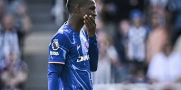 Chelsea's Senegalese striker #15 Nicolas Jackson reacts as he leaves the pitch after receiving a red card following a tackle on Newcastle United's Dutch defender #04 Sven Botman during the English Premier League football match between Newcastle United and Chelsea at St James' Park in Newcastle-upon-Tyne, north east England on May 11, 2025. (Photo by ANDY BUCHANAN / AFP) / RESTRICTED TO EDITORIAL USE. No use with unauthorized audio, video, data, fixture lists, club/league logos or 'live' services. Online in-match use limited to 120 images. An additional 40 images may be used in extra time. No video emulation. Social media in-match use limited to 120 images. An additional 40 images may be used in extra time. No use in betting publications, games or single club/league/player publications. /  (Photo by ANDY BUCHANAN/AFP via Getty Images)