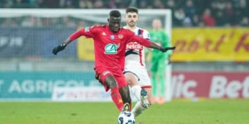 Dame GUEYE of Le Mans and Lucas BERALDO of Paris Saint Germain during the French Cup match between Le Mans and Paris Saint-Germain at Stade Marie-Marvingt on February 4, 2025 in Le Mans, France. (Photo by Daniel Derajinski/Icon Sport via Getty Images)