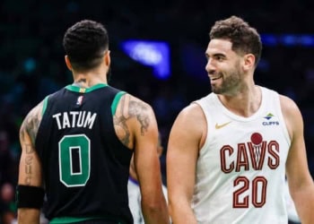 BOSTON, MASSACHUSETTS - NOVEMBER 19: Georges Niang #20 of the Cleveland Cavaliers reacts alongside Jayson Tatum #0 of the Boston Celtics during the third quarter of the Emirates NBA Cup at TD Garden on November 19, 2024 in Boston, Massachusetts. NOTE TO USER: User expressly acknowledges and agrees that, by downloading and or using this photograph, User is consenting to the terms and conditions of the Getty Images License Agreement.  (Photo by Winslow Townson/Getty Images)