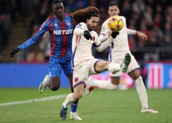 LONDON, ENGLAND - JANUARY 04: Marc Cucurella of Chelsea clears the ball ahead of Ismaila Sarr of Palace during the Premier League match between Crystal Palace FC and Chelsea FC at Selhurst Park on January 04, 2025 in London, England. (Photo by Julian Finney/Getty Images)