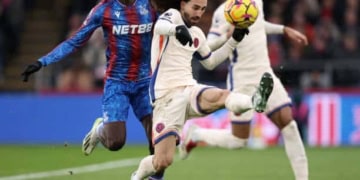 LONDON, ENGLAND - JANUARY 04: Marc Cucurella of Chelsea clears the ball ahead of Ismaila Sarr of Palace during the Premier League match between Crystal Palace FC and Chelsea FC at Selhurst Park on January 04, 2025 in London, England. (Photo by Julian Finney/Getty Images)