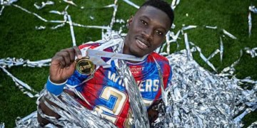 LONDON, ENGLAND - MAY 17: Ismaila Sarr of Crystal Palace celebrates with a medal after winning the Emirates FA Cup Final match between Crystal Palace and Manchester City at Wembley Stadium on May 17, 2025 in London, England. (Photo by Sebastian Frej/Getty Images)