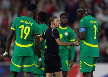 NOTTINGHAM, ENGLAND - JUNE 10: Referee Stephanie Frappart talks with Moussa Niakhate and Kalidou Koulibaly of Senegal during the international friendly match between England and Senegal at the City Ground on June 10, 2025 in Nottingham, England. (Photo by Visionhaus/Getty Images)