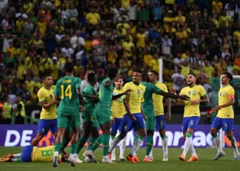 LISBON, PORTUGAL - JUNE 20: Éder Militão of Brazil and Nicolas Jackson of Senegal clash over a foul during an International Friendly match between Brazil and Senegal at Estadio Jose Alvalade on June 20, 2023 in Lisbon, Portugal. (Photo by Zed Jameson/MB Media/Getty Images)