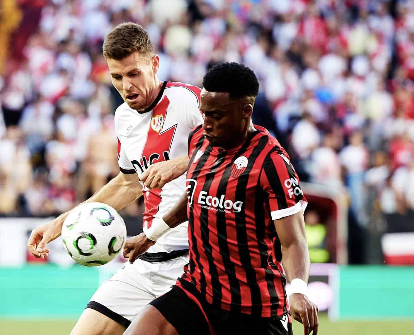MADRID, SPAIN - OCTOBER 02: Gerard Gumbau of Rayo Vallecano competes for the ball with Fabrice Tamba of KF Shkendija during the UEFA Conference League 2025/26 League Phase MD1 match between Rayo Vallecano de Madrid and KF Shkendija at Estadio Vallecas on October 02, 2025 in Madrid, Spain. (Photo by Alvaro Medranda/Quality Sport Images/Getty Images)
