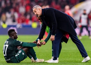 LISBON, PORTUGAL - FEBRUARY 18: AS Monaco Head Coach Adi Hutter (R) comforts player Krépin Diatta (L) during the UEFA Champions League 2024/25 League Knockout Play-off second leg match between SL Benfica and AS Monaco at Estádio do Sport Lisboa e Benfica on February 18, 2025 in Lisbon, Portugal. (Photo by Miguel Lemos/Eurasia Sport Images/Getty Images)