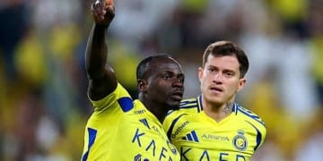 RIYADH, SAUDI ARABIA - MAY 07: Sadio Mane of Al Nassr celebrates with teammate Otavio
 after scoring his team's first goal during the Saudi Pro League match between Al Nassr and Al Ittihad at Al-Awwal Park on May 07, 2025 in Riyadh, Saudi Arabia. (Photo by Abdullah Ahmed/Getty Images)