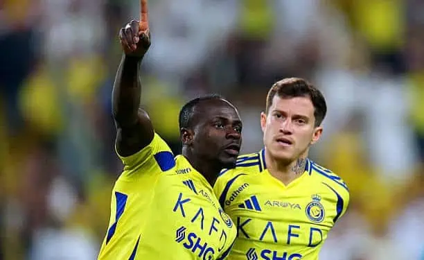RIYADH, SAUDI ARABIA - MAY 07: Sadio Mane of Al Nassr celebrates with teammate Otavio
 after scoring his team's first goal during the Saudi Pro League match between Al Nassr and Al Ittihad at Al-Awwal Park on May 07, 2025 in Riyadh, Saudi Arabia. (Photo by Abdullah Ahmed/Getty Images)