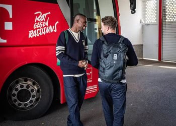 Munich; Germany - NOVEMBER 03: (EDITORS NOTE: Image has been digitally enhanced.) Nicolas Jackson of FC Bayern Muenchen in front of the team bus that will take him to the airport after a training session at the Saebener Strasse training ground in Munich, southern Germany on November 03, 2025 in Munich, Germany. (Photo by F. Noever/FC Bayern via Getty Images)