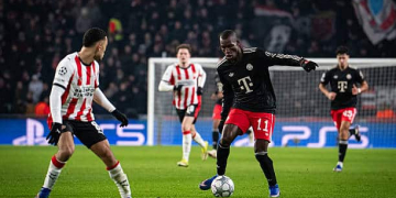 EINDHOVEN, NETHERLANDS - JANUARY 28: Nicolas Jackson of FC Bayern Muenchen is being challenged during the UEFA Champions League 2025/26 League Phase MD8 match between PSV Eindhoven and FC Bayern München at PSV Stadion on January 28, 2026 in Eindhoven, Netherlands. (Photo by S. Mellar/FC Bayern via Getty Images)