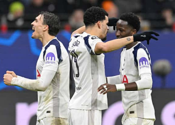 28 January 2026, Hesse, Frankfurt/Main: Soccer: Champions League, Eintracht Frankfurt - Tottenham Hotspur, Preliminary Round, Matchday 8, Deutsche Bank Park. Dominic Solanke (M, Tottenham Hotspur) celebrates his goal for 0:2 with Pape Matar Sarr (r, Tottenham Hotspur) and João Palhinha (Tottenham Hotspur). Photo: Uwe Anspach/dpa (Photo by Uwe Anspach/picture alliance via Getty Images)