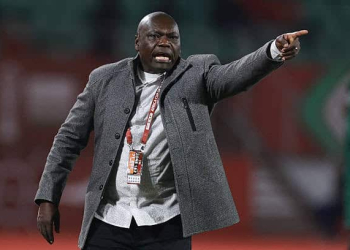 Cameroon's head coach David Pagou shouts instructions to his players from the touchline during the Africa Cup of Nations (CAN) Group F football match between Mozambique and Cameroon at the Grand Stadium in Agadir on December 31, 2025. (Photo by FRANCK FIFE / AFP via Getty Images)