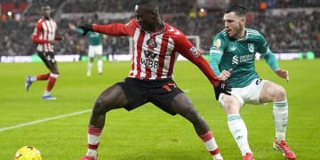 Sunderland's Habib Diarra (left) and Liverpool's Andrew Robertson battle for the ball during the Premier League match at the Stadium of Light, Sunderland. Picture date: Wednesday February 11, 2026. (Photo by Danny Lawson/PA Images via Getty Images)