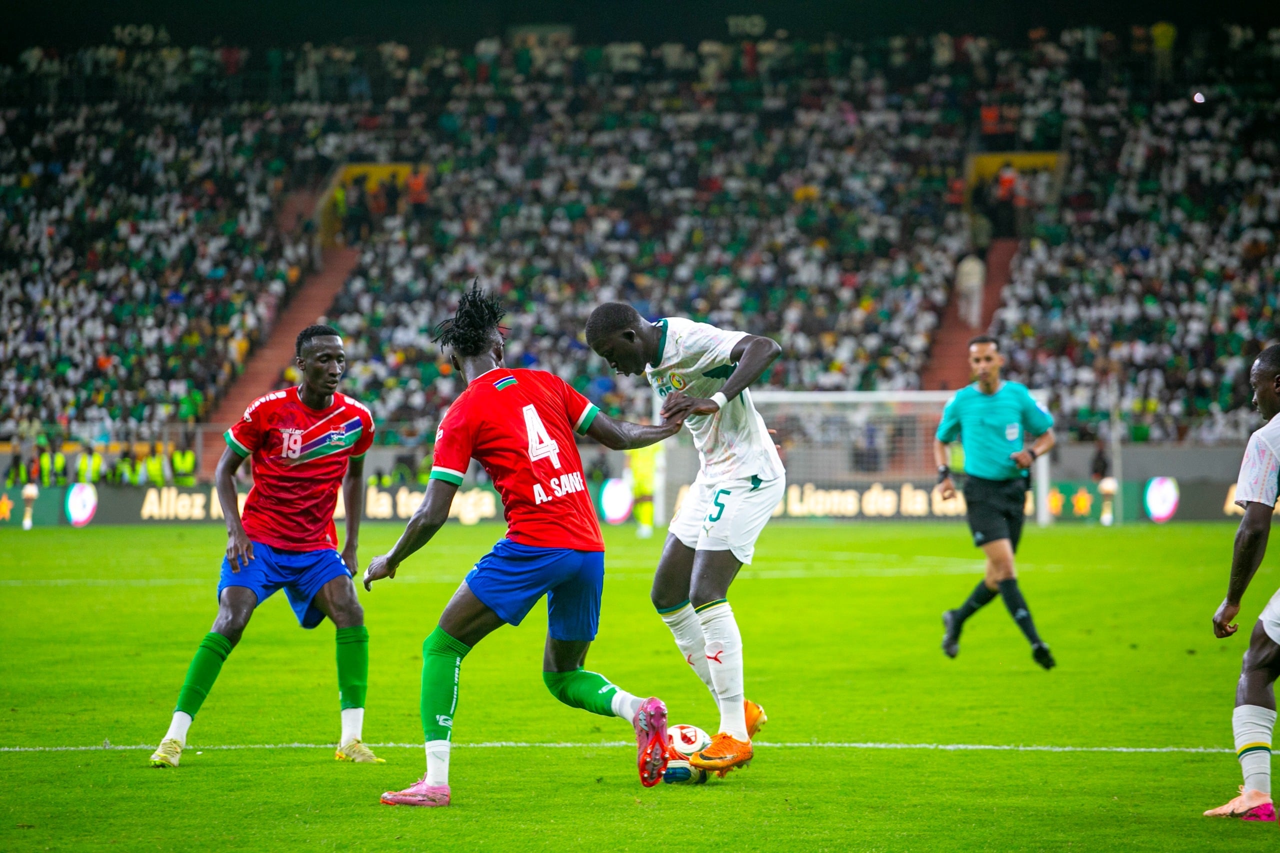 Sénégal vs Gambie : Les Lions creusent l’écart au retour des vestiaires grâce à Ibrahim Mbaye - wiwsport Sénégal vs Gambie : Les Lions creusent l’écart au retour des vestiaires grâce à Ibrahim Mbaye - wiwsport