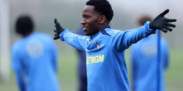 ENFIELD, ENGLAND - MARCH 09: Pape Matar Sarr of Tottenham Hotspur reacts during a training session ahead of the UEFA Champions League 2025/26 Round of 16 First Leg match between Atletico de Madrid and Tottenham Hotspur at Tottenham Hotspur Training Centre on March 09, 2026 in Enfield, England.  (Photo by Paul Harding/Getty Images)
