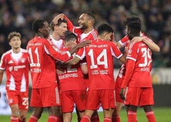 HAMBURG, GERMANY - APRIL 11: (LR) Nicolas Jackson of FC Bayern München Leon Goretzka of FC Bayern München Jonathan Tah of FC Bayern München Luis Diaz of FC Bayern München celebrates the team's fifth goal  from Raphael Guerreiro of Bayern München during the Bundesliga match between FC St. Pauli and FC Bayern München at Millerntor Stadium on April 11, 2026 in Hamburg, Germany. (Photo by Jürgen Fromme - firo sportphoto/Getty Images)