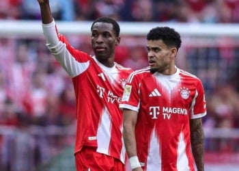 MUNICH, GERMANY - APRIL 19: Nicolas Jackson of FC Bayern Muenchen celebrates with Luis Diaz of FC Bayern Muenchen and Jamal Musiala of FC Bayern Muenchen after scoring his team`s second goal during the Bundesliga match between FC Bayern M?nchen and VfB Stuttgart at Allianz Arena on April 19, 2026 in Munich, Germany. (Photo by Christina Pahnke - sampics/Corbis via Getty Images)