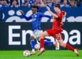 Gelsenkirchen, Germany - May 2: Moussa Ndiaye of FC Schalke 04 passes the ball under pressure from Cedric Itten of Fortuna Dusseldorf during the German 2. Bundesliga match between FC Schalke 04 and Fortuna Dusseldorf at Veltins-Arena on May 2, 2026 in Gelsenkirchen, Germany. (Photo by Marcel ter Bals/DeFodi Images/DeFodi via Getty Images)