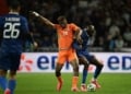 Ivory Coast's defender #20 Emmanuel Agbadou (L) and France's forward #22 Jean Mateta (R) fight for the ball during the international friendly football match between France and Ivory Coast ahead of the 2026 FIFA World Cup football tournament at the Stade de la Beaujoire in Nantes, western France, on June 4, 2026. (Photo by Loic VENANCE / AFP via Getty Images)