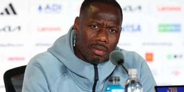SEATTLE, WASHINGTON - JULY 01: Pape Thiaw, Head Coach of Senegal, speaks to the media in a post match press conference after the FIFA World Cup 2026 Round Of 32 match between Belgium and Senegal at Seattle Stadium on July 01, 2026 in Seattle, Washington. (Photo by Sarah Stier - FIFA/FIFA via Getty Images)