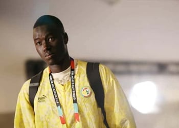 SEATTLE, WASHINGTON - JULY 01: Pape Gueye #26 of Senegal arrives at the stadium before the FIFA World Cup 2026 Round Of 32 match between Belgium and Senegal at Seattle Stadium on July 01, 2026 in Seattle, Washington. (Photo by Jared C. Tilton - FIFA/FIFA via Getty Images)