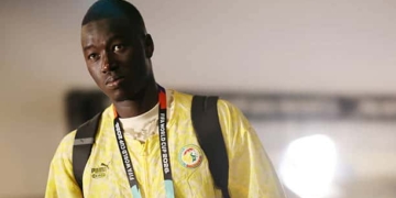 SEATTLE, WASHINGTON - JULY 01: Pape Gueye #26 of Senegal arrives at the stadium before the FIFA World Cup 2026 Round Of 32 match between Belgium and Senegal at Seattle Stadium on July 01, 2026 in Seattle, Washington. (Photo by Jared C. Tilton - FIFA/FIFA via Getty Images)