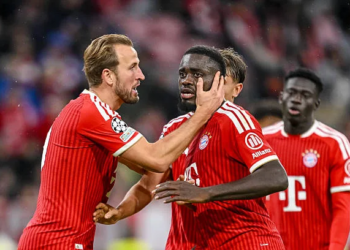 Munich, Germany - October 21: Harry Kane of FC Bayern München and Dayot Upamecano of FC Bayern München gestures during the UEFA Champions League 2026/2027 match between Bayern München and Arsenal at Fußball Arena München on October 21, 2026 in Munich, Germany. (Photo by Harry Langer/DeFodi Images/DeFodi via Getty Images)
