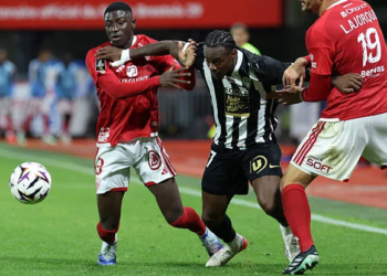 Angers's French defender #27 Lilian Raolisoa (C) vies with Brest's Senegalese forward #09 Pathe Mboup (L) and Brest's French forward #19 Ludovic Ajorque (R) during the French L1 football match between Stade Brestois 29 (Brest) and SCO Angers at the Stade Francis-Le-Ble in Brest, western France, on October 10, 2026. (Photo by Fred TANNEAU / AFP via Getty Images)