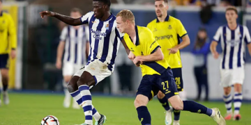 LEUVEN, BELGIUM - OCTOBER 15: (L-R) Mamadou Sarr of Real Sociedad, Louis Patris of Union St Gilloise during the UEFA Europa League   match between Union St. Gilloise v Real Sociedad at the Den Dreef on October 15, 2026 in Leuven Belgium (Photo by Joris Verwijst/Soccrates/Getty Images)